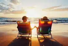 Couple watching the sunset on the beach