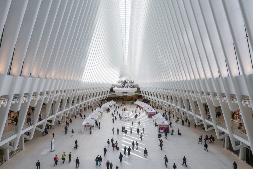 People wandering around the inside of the Oculus